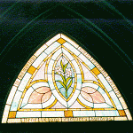 The Girl's Friendly Society Window, installed in 1945 in the doorway of the Bell Tower.