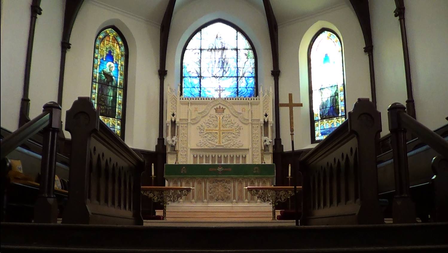 The three stained-glass chancel windows at Saint Anne’s